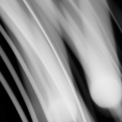 A blurred motion shot of an athlete, suggesting fluid movement and flow.